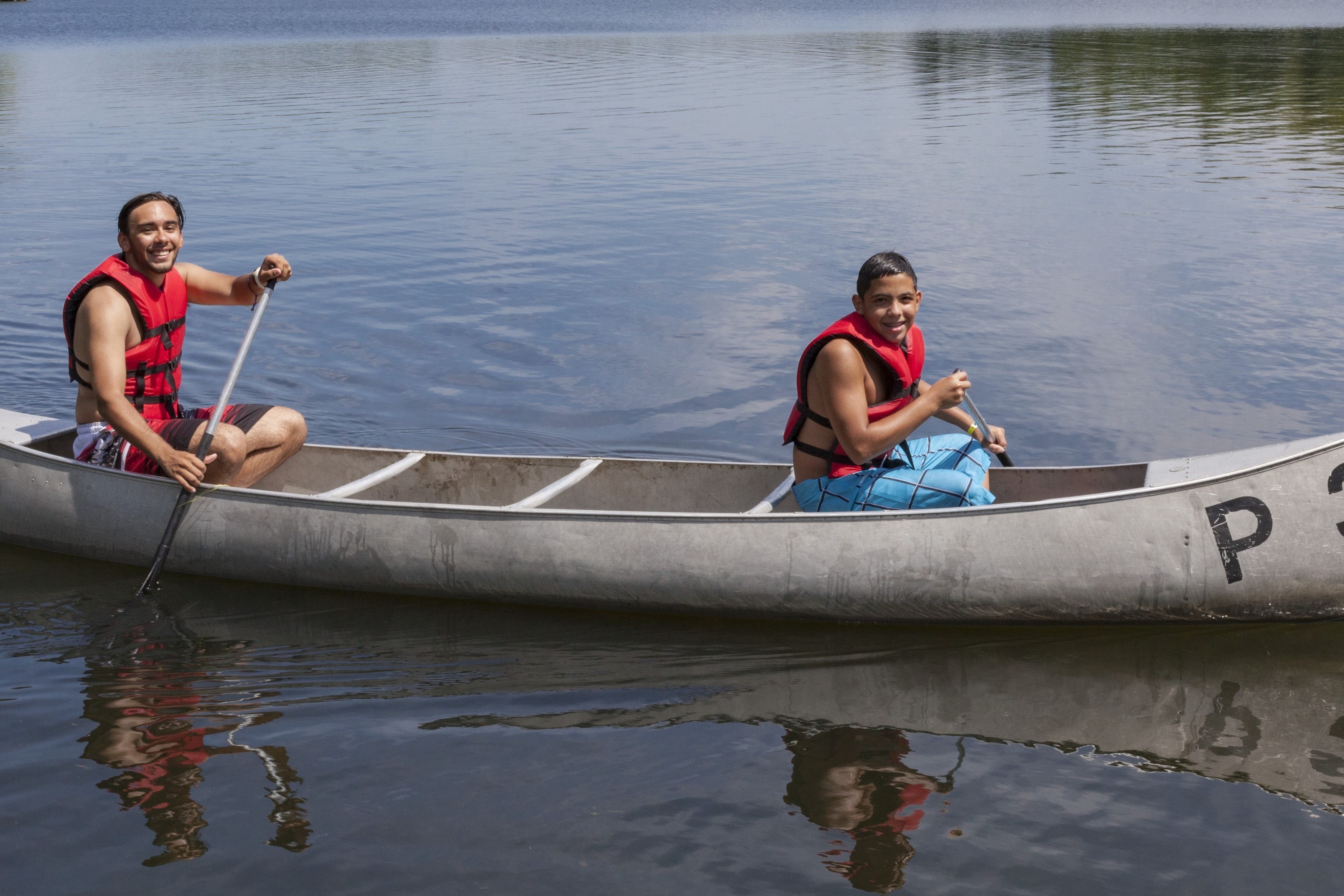 Two people in a canoe.